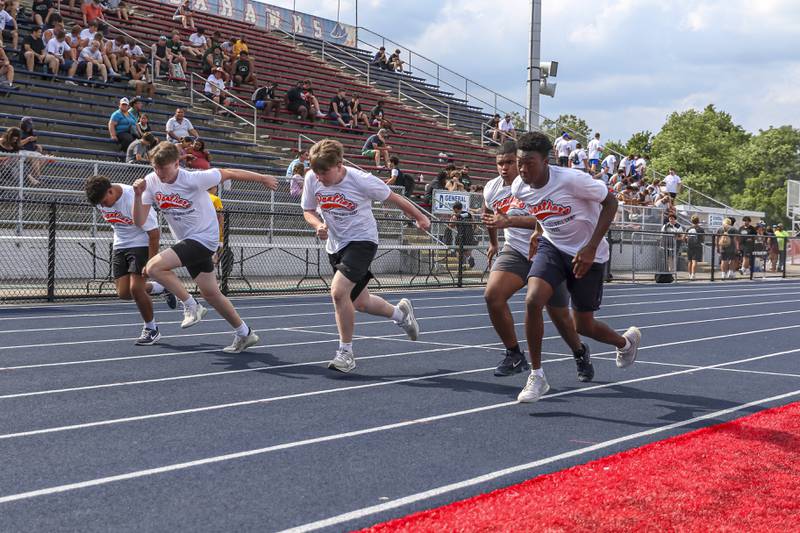 Oswego sophomores takes off in the timed 40 yard dash during the West Aurora "Battle of the Butts" Lineman Challenge, July 10, 2025  in Aurora.