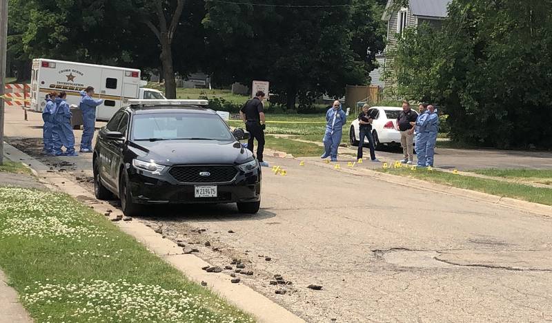 Investigators from the McHenry County Major Investigation Assistance Team (MIAT) on Sunday, June 4, 2023, on the 700 block of Dewey Street, Harvard. A Harvard officer shot and killed a man police said had fatally stabbed a woman to death at about 11:30 p.m. Saturday.