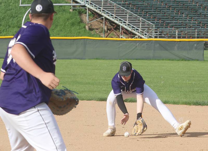 Serena's Nate Kelley fields a ground ball as first baseman Carter Meyer waits for the throw on Friday, April 24, 2026 at St. Bede Academy.