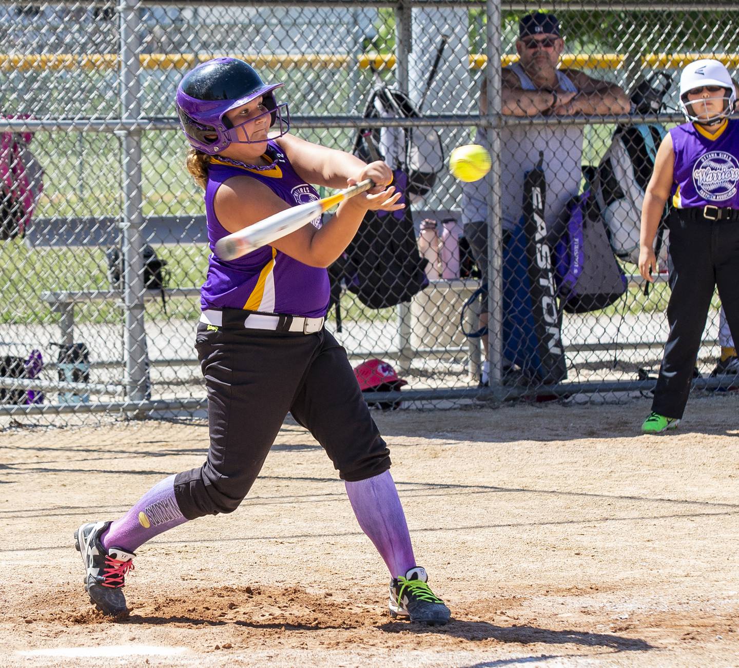 The Warriors' Jillian Thrush takes a swing in the second inning Saturday, July 9, 2022, during the  Ottawa Girls Fastpitch Association 11U city championship game at Peck Park.