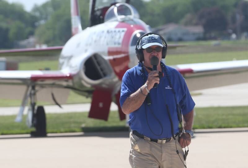 Tim Gillian, emcee and the voice of the TBM Avenger Reunion air show, announces during the 10th annual TBM Avenger Reunion and Airshow on Friday, May 16, 2025 at the Illinois Valley Regional Airport in Peru.