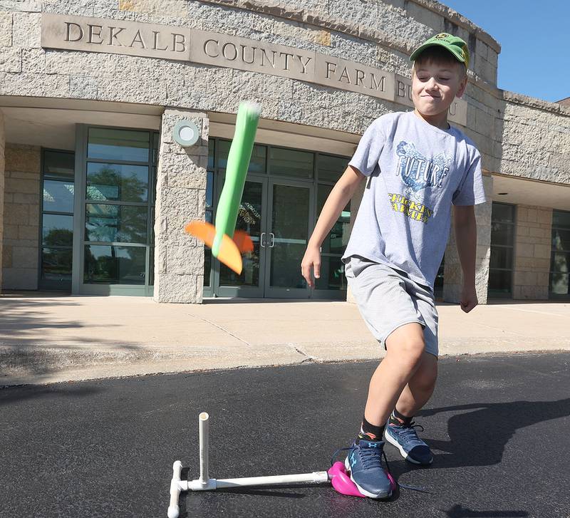 Samuel Hetland, 11, from Clare, launches the rocket he built during the 4-H General Project Show Thursday, July 14, 2022, at the DeKalb County Farm Bureau in Sycamore.