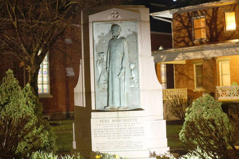 A view of the Pere Marquette memorial at night on Thursday, March 2, 2026 at St. Mary's Catholic Church in Utica. it was on Holy Thursday 351 years ago that Fr. Marquette offered the first Mass in Illinois territory here. Utica is historically the spot where the first Mass was said in Illinois