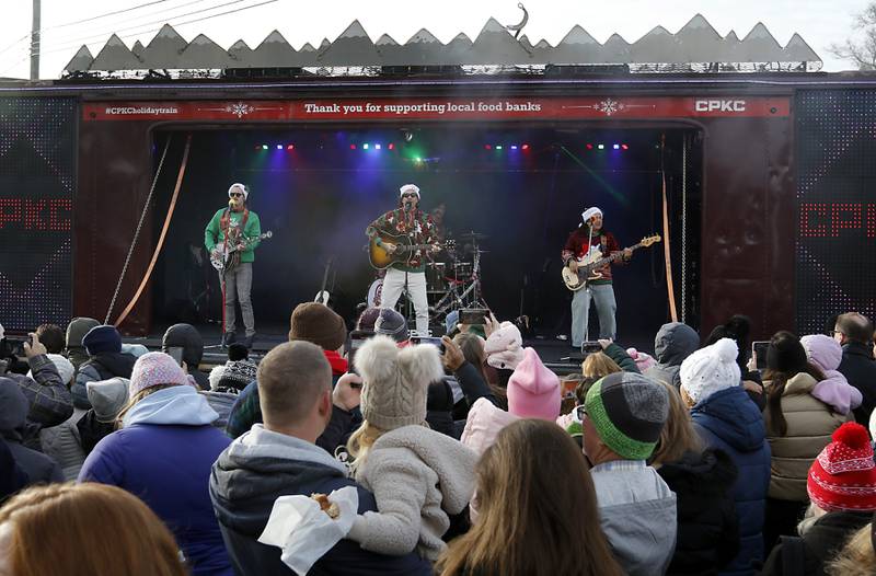 American Authors perform during a stop in Pingree Grove on Wednesday Nov. 27, 2024, by the Canadian Pacific Kansas City Railway 2024 Holiday Train. The holiday train raised food and monetary donations for the D300 Food Pantry during its stop in Pingree Grove.
