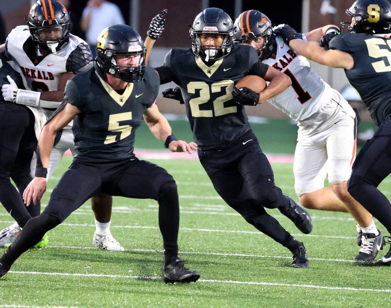 Sycamore's Dylan Curtis gets through the DeKalb defensive line Friday, Aug. 29, 2025, during the FNBO Challenge in Huskie Stadium at Northern Illinois University.