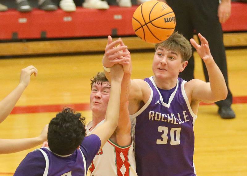 L-P's Regan Doerr and Rochelle's SWarren Schweitzer battle for a rebound on Friday, Feb. 13, 2026 in Sellett Gymnasium at L-P High School.