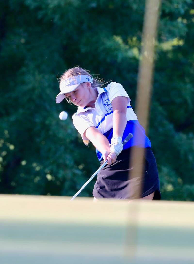 Princeton's Addie Hecht chips on to the green during Thursday's meet at Wyaton Hills.