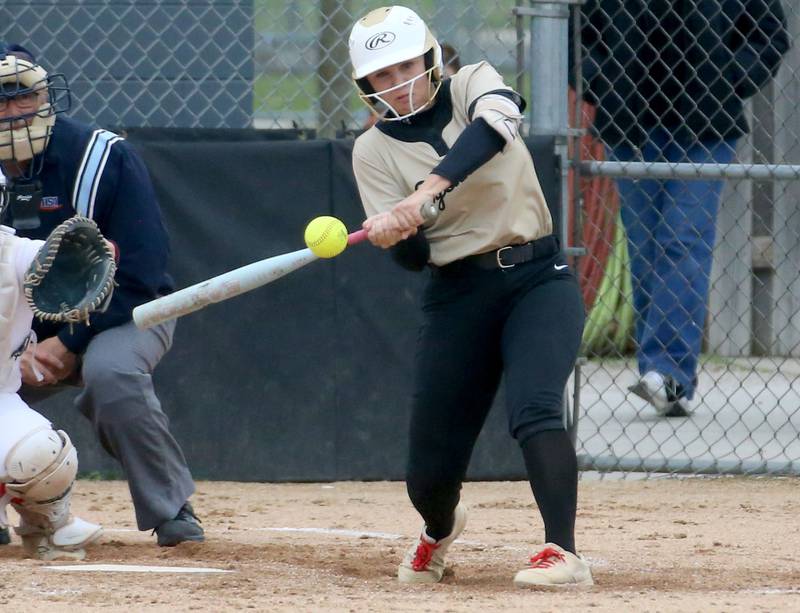 Sycamore's Faith Heil makes contact with the ball against Ottawa on Tuesday, May 5, 2026 at Peck Park in Ottawa.