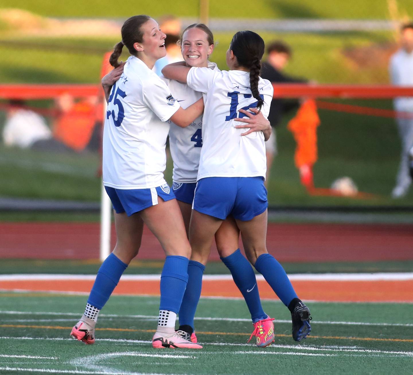 St. Charles North’s Kaitlyn Nudera (center) celebrates her goal during a Tri-Cities Soccer Night game against St. Charles East on Tuesday, April 29, 2025 in St. Charles.