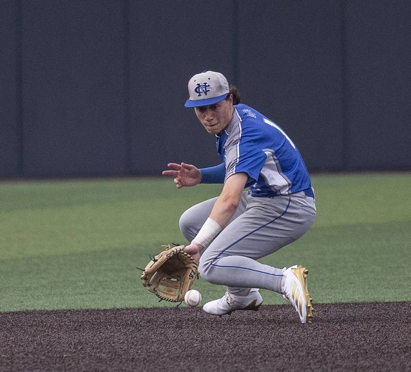 Newman’s Garret Matznick makes a play in the hole against Teutopolis Friday, June 6, 2025, during the Class 2A state semifinal at Illinois Field in Champaign.