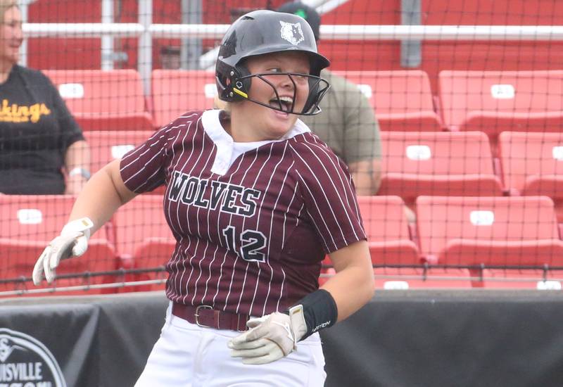 Prairie Ridge's Bella Moore reacts after scoring a run against Burbank St. Laurence during the Class 3A State third place game on Saturday, June 14, 2025 at the Louisville Slugger Sports Complex in Peoria.