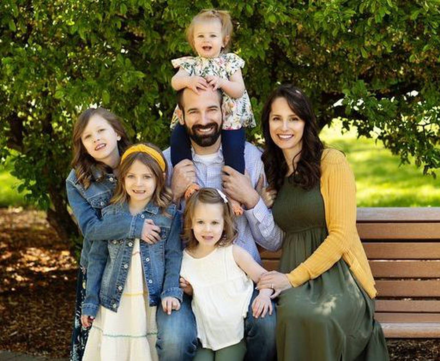 Ashley and Matthew Klockenga with their four daughters.
