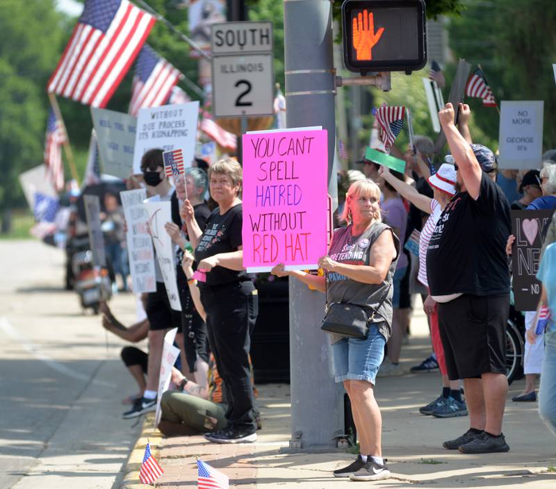A "No Kings" rally was held in Oregon, Illinois on Saturday, June 14, 2025. Close to 500 people took part in the 2-hour event to protest actions by President Donald Trump. People carried signs critical of Trump’s policies and executive orders as they lined the north and east sidewalks of the courthouse square in the town of 3,566. A small group of Trump supporters also displayed signs at the rally.