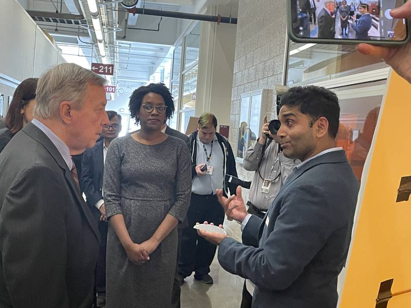 U.S. Sen. Dick Durbin (left) and U.S. Rep. Lauren Underwood (center) take a tour of NIU's College of Engineering and Engineering Technology, shown here April 5, 2023.