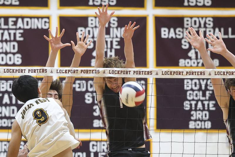 Lockport’s Ryan Beaumont blocks a shot for a point against Joliet West on Tuesday, March 31, 2026 in Joliet.
