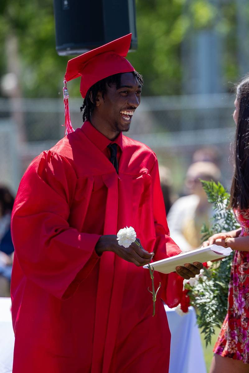 Jeremy Smith smiles after receiving diploma on Sunday, May 18, 2025 at Hall High School in Spring Valley.