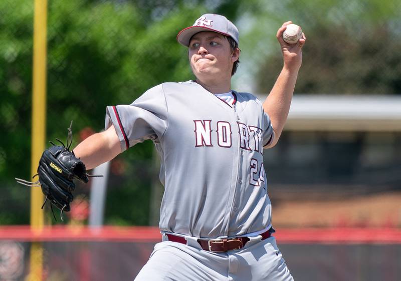 Plainfield North's Luke Brown (24) delivers a pitch against Yorkville during the Class 4A Yorkville Regional baseball final at Yorkville High School on Saturday, May 28, 2022.