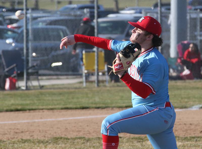 Hall's Joe Schrader delivers a pitch to Ottawa on Tuesday, March 28, 2023 at Ottawa High School.