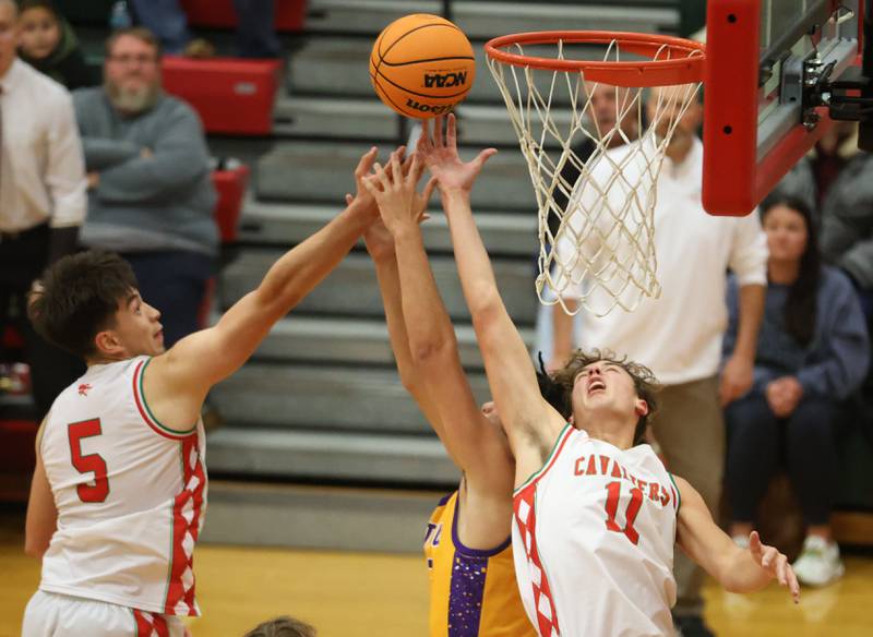 L-P's Erick Sotelo and Jameson Hill grab a rebound against Rantoul on Friday, Dec. 19, 2025 in Sellett Gymnasium at L-P High School.