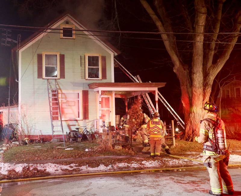 Firefighters work the scene of a structure fire in the 300 block of South Chestnut Street on Friday, Dec. 19, 2025 in Princeton. Fire departments from  from Malden, Bureau, Walnut, Princeton, Spring Valley, Ladd and Wyanet all responded to the scene.