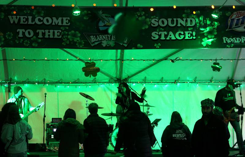 The Vinyl Goldmine musical group entertains at the ShamROCKS the Fox Festival in McHenry Friday, March 17, 2023.