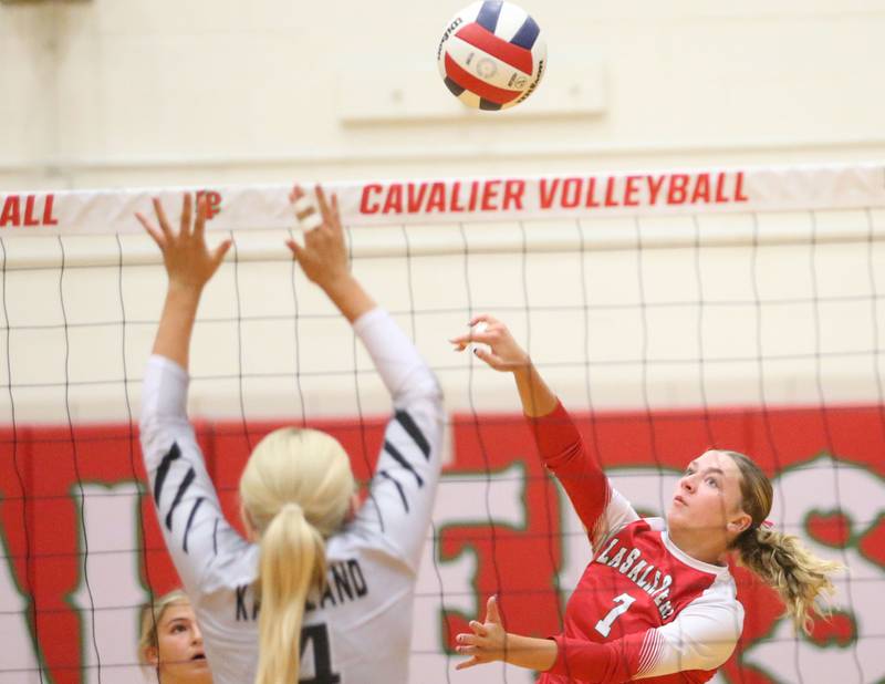 L-P's Aubrey Duttlinger sends a kill past Kaneland's Mylee Crosby on Tuesday, Oct. 7, 2025 in Sellett Gymnasium at L-P High School.