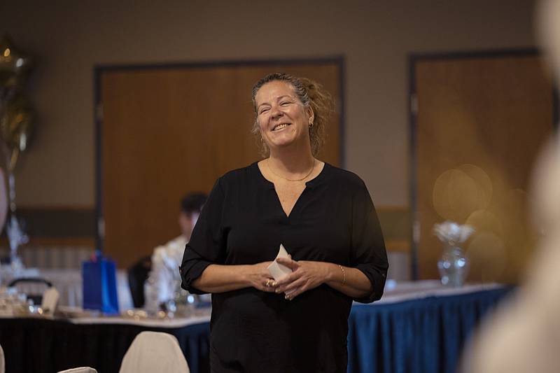 Jennifer Lang smiles after having been named the recipient of the Community Pride award Friday, April 5, 2024 during the Best of Dixon Awards.