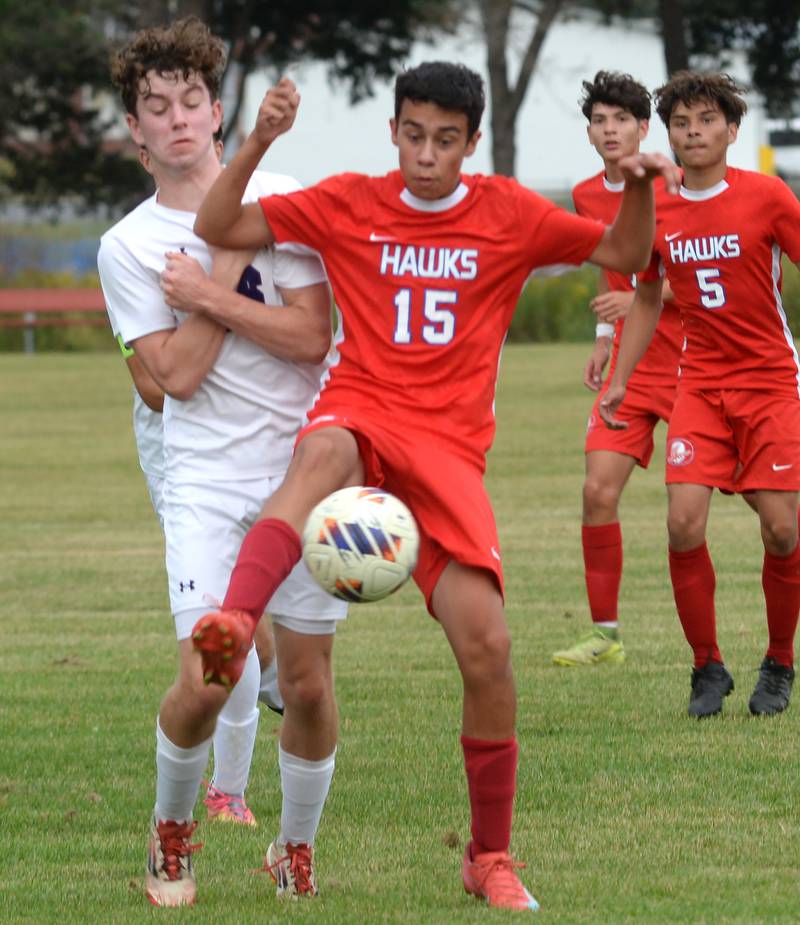 Oregon's david Eckardt (15) battles a Pecatonica player  for the ball on Tuesday, Sept. 23, 2025 at Oregon Park West.