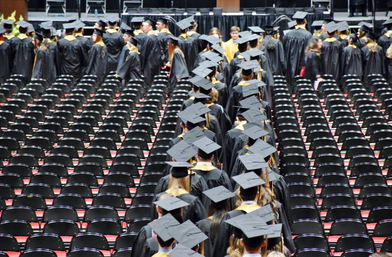 Sycamore High School graduates process into the commencement ceremony for the Class of 2022. The commencement was held Sunday, May 22, 2022 at Northern Illinois University's Convocation Center in DeKalb.