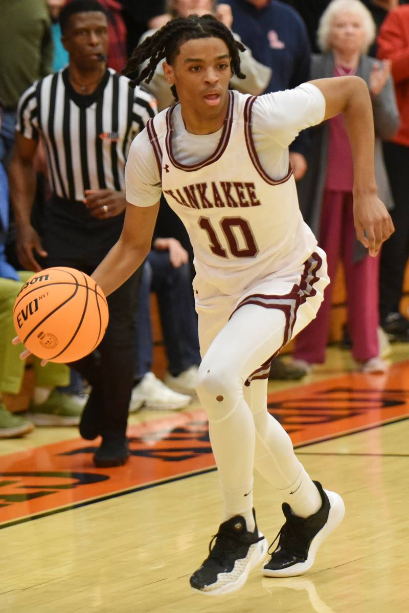 Kankakee's Kenaz Jackson Jr. drives the court during the Kays' IHSA Class 3A Washington Sectional semifinal against Metamora Tuesday, March 4, 2025.