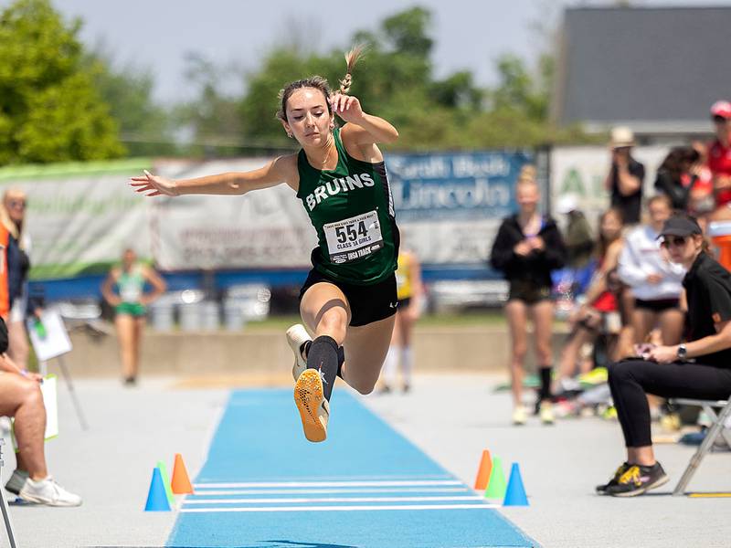 St. Bede’s Anna Lopez makes her attempt in the 1A triple jump Saturday, May 20, 2023 during the IHSA state track and field finals at Eastern Illinois University in Charleston.