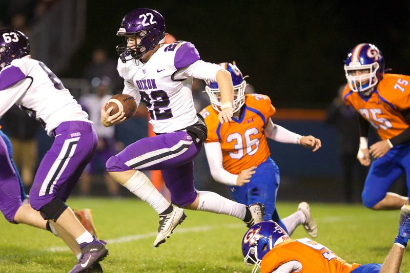 Dixon's Aiden Wiseman runs the ball for a gain against Genoa - Kingston on Friday Oct.7,2022 in Genoa.