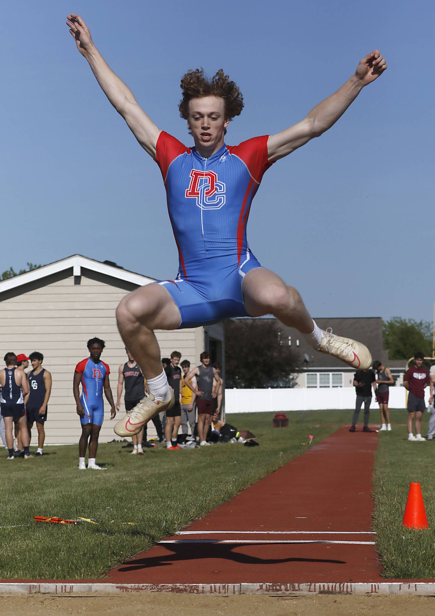 Dundee-Crown's Kyle Brents competes in the long jump during the Fox Valley Conference  Boys Track and Field Meet on Thursday, May 14, 2026, at Huntley High School.