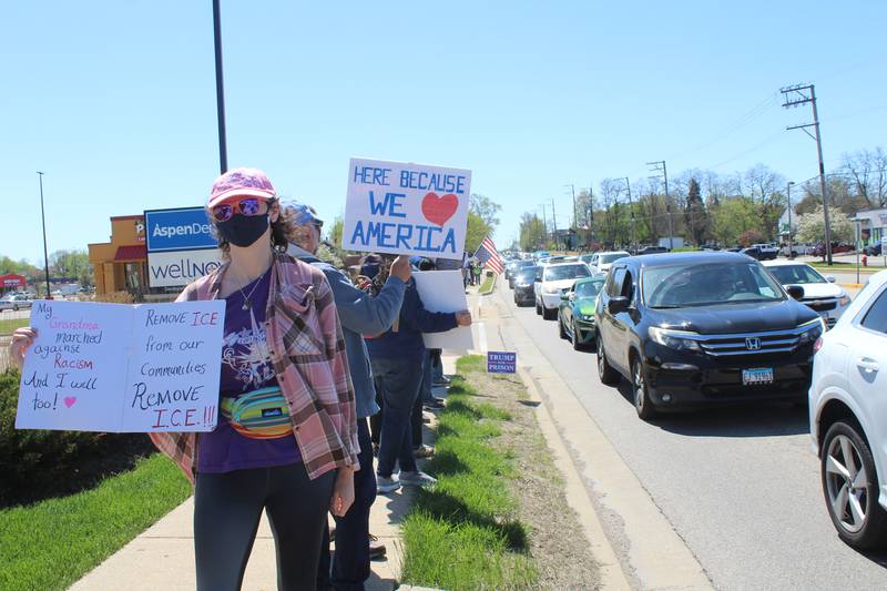 Protesters line up along Route 31 in McHenry voicing their opposition to detention centers used for immigration enforcement on April 25, 2026.
