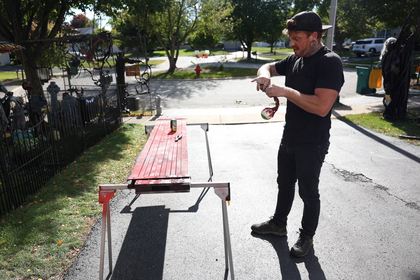 Dave Appel works on his Halloween decorations for his home in Plainfield. Tuesday, Sept. 27, 2022, in Plainfield.