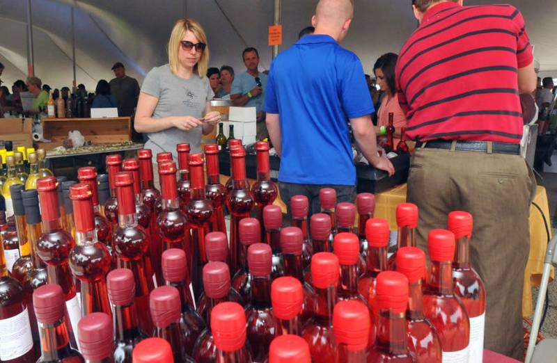 Rows of wine bottles await buyers during Saturday's Ottawa 2 Rivers Wine Fest. Many people attended the annual event.