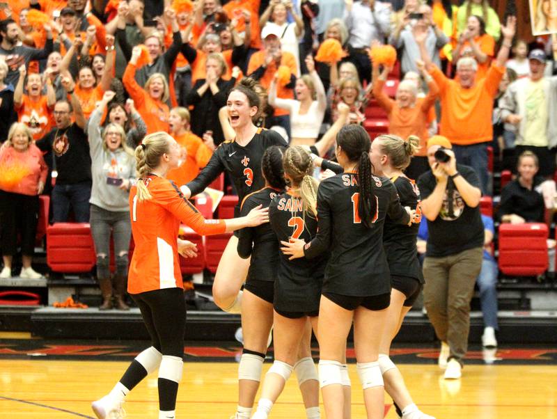 St. Charles East players celebrate their Class 4A Proviso Sectional final win over Willowbrook on Wednesday, Nov. 2, 2022.