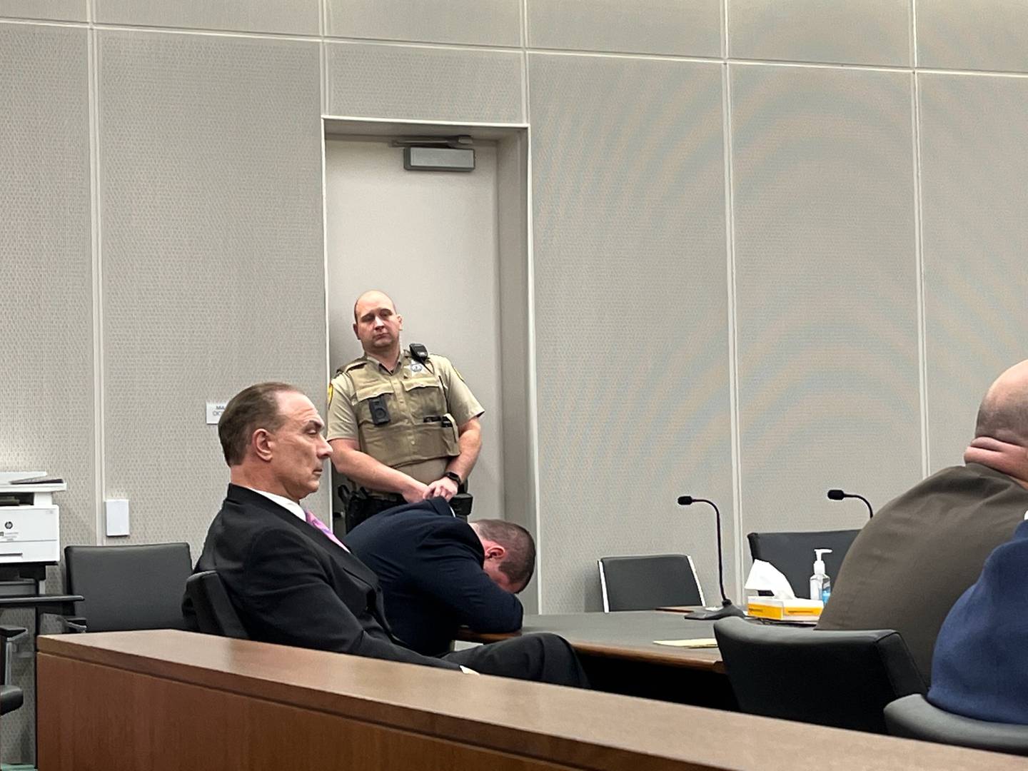 Joliet Outlaw member Jeremy Boshears buries his head after he was found guilty on Monday, May 2, 2022, of murdering his girlfriend, Katie Kearns.