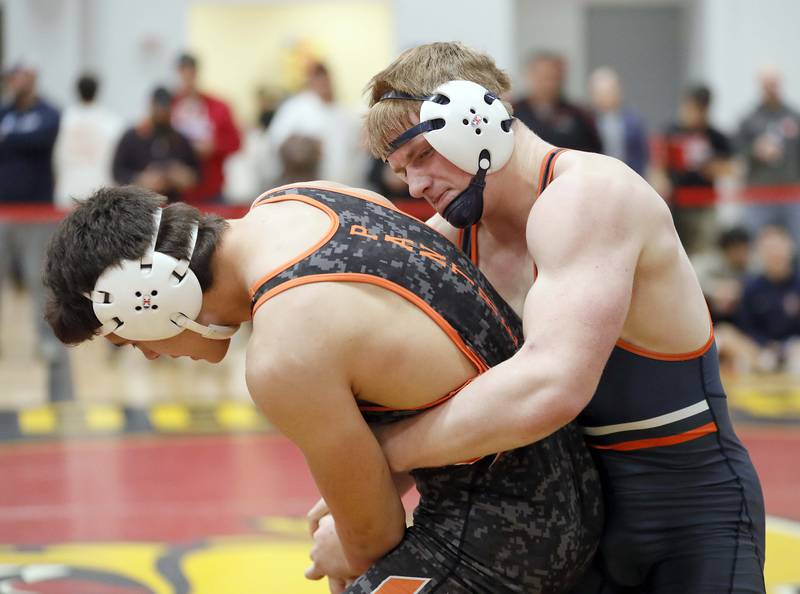 Caden Watson of Buffalo Grove wrestles Josh Hoffer of Washington at 195 pounds during the Batavia wrestling invite Saturday January 14, 2023 in Batavia.