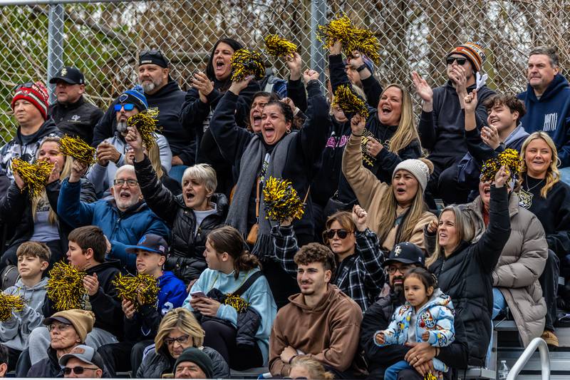 Oak Forest fans cheer on the Bengals during a 5A varsity football semifinal game against Providence at Providence Catholic High School on Nov. 22, 2025.