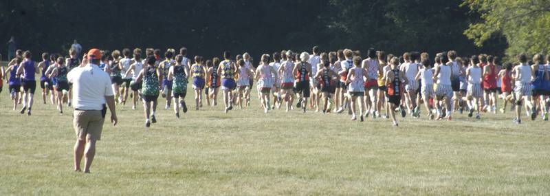 Boys varsity CC begins their race. Local High School teams gathered at Hoover Park in Sterling for the Rock River Run, held on Saturday, September 27, 2025.