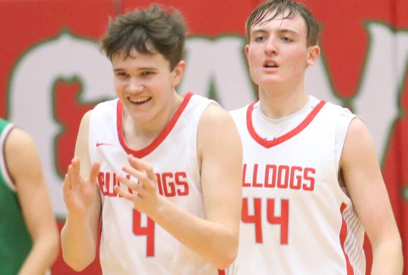 Streator's Blaize Bressner reacts with teammate Nolan Lukach after taking the lead against Streator in the fourth quarter during the Class 3A Regional title game on Friday, Feb. 28, 2025 in Sellett Gymnasium at L-P High School.