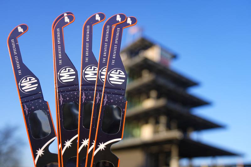 Eclipse glasses are shown at the Indianapolis Motor Speedway in Indianapolis, Monday, April 8, 2024. (AP Photo/Michael Conroy)