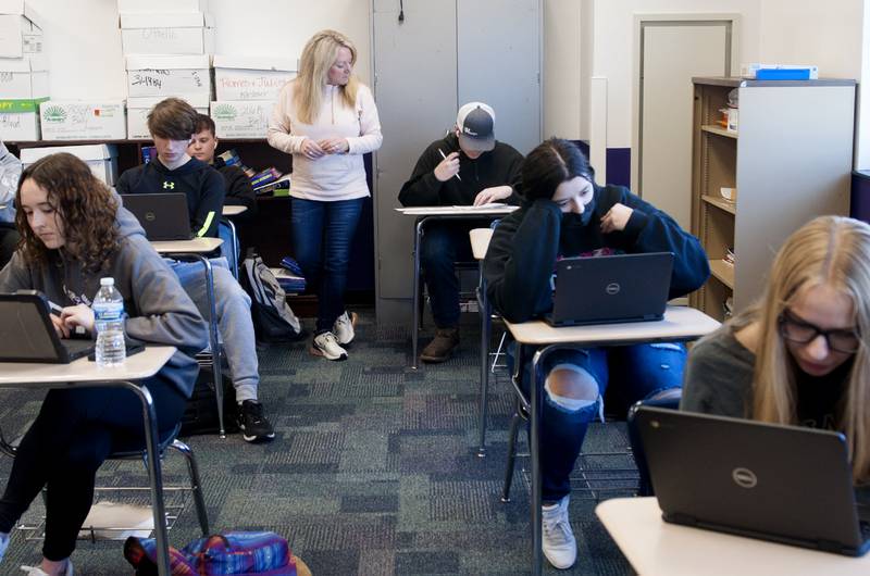 Jenny Kirchner works with her students at Dixon High School. Kirchner has dedicated the past 32 years to educating the students of Dixon public schools. Her love of teaching stretches back even further.