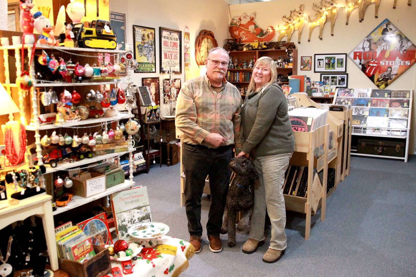 Carrie and Bob Auwaerter, with their Labradoodle, Danny, own Vinyl & Vintage in downtown Elburn. Small Business Saturday will be Saturday, Nov. 30, 2024.