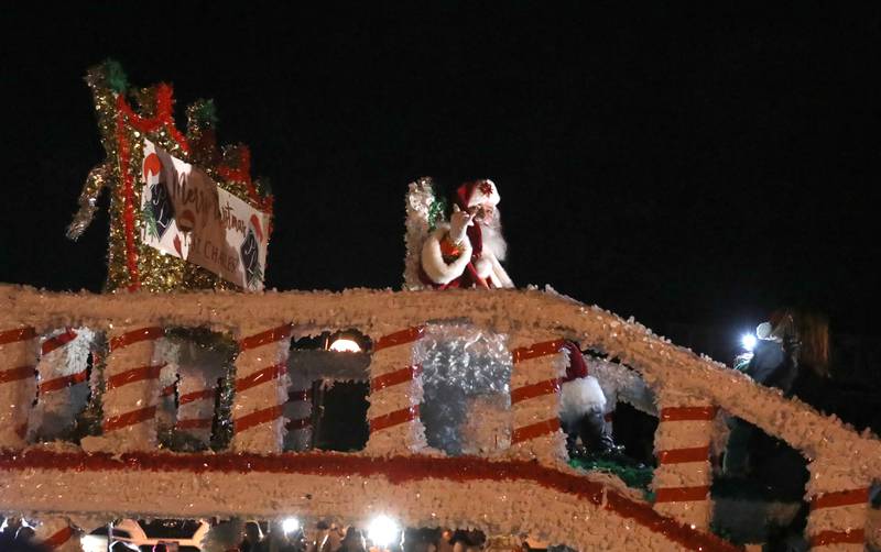 Santa Claus was the finale of the Electric Christmas Parade, part of the City of St. Charles’ Holiday Homecoming festivities, on Main Street in St. Charles on Saturday, Nov. 26, 2022. The events were hosted by the St. Charles Business Alliance.
