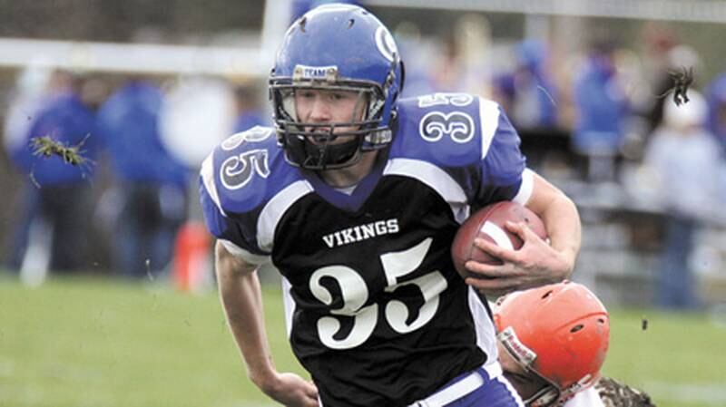 Geneva running back Jay Graffagna escapes a tackle and heads upfield during Saturday’s IHSA Class 7A first-round playoff game against Shepard.  The Vikings face Wheaton Warrenville South in the second round. Jeff Krage – For the Chronicle