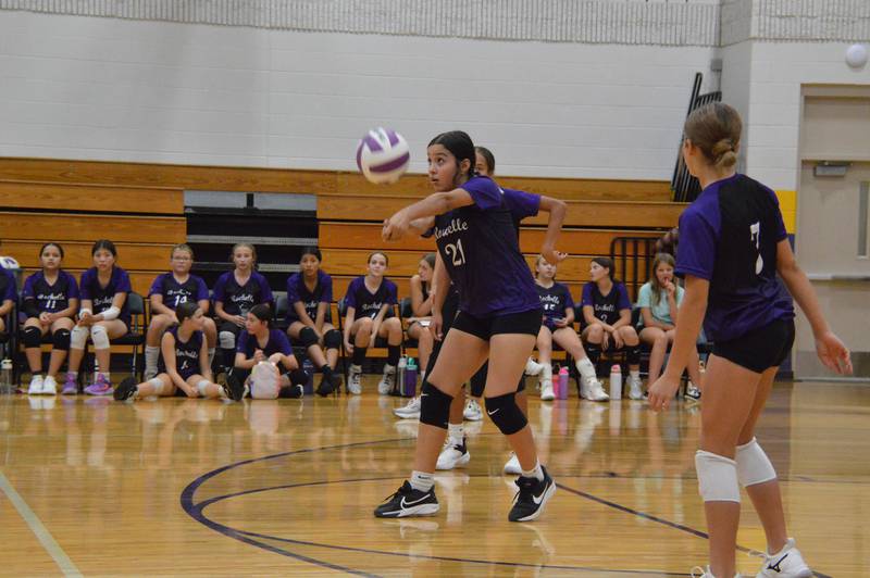Rochelle's Emily Garcia passes the ball during a seventh-grade volleyball match with Prairie Knolls.