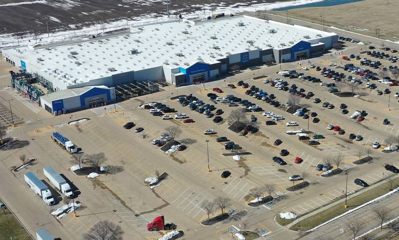 An aerial view of Wal-Mart on Wednesday, March 18, 2026 in Ottawa. The building opened in 2006, on Veterans Drive occuping a 205,000 square foot facility. 
The original Wal-Mart was built in 1985 on Etna Road (where Warehouse Bargans) occupies it today. It was a 91,115 square-foot building.