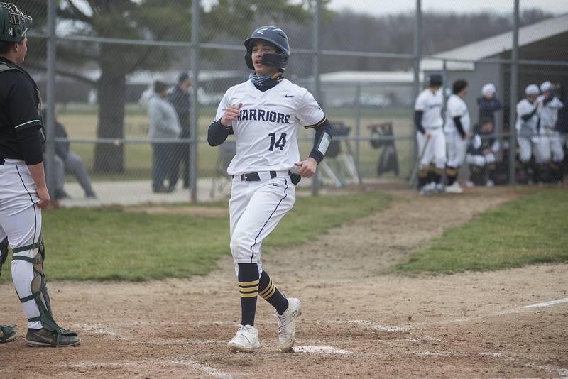 Sterling's Gio Cantu comes in to score in the third inning against Alleman on Tuesday, April 5, 2022.